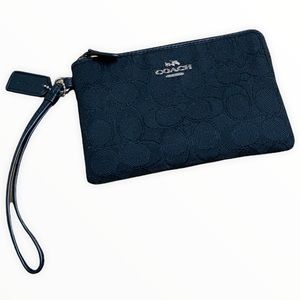 GET IT Now! Coach Wristlet!